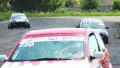 Racing sport cars pass by track tarmac during race laps Video