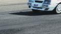 Sport cars pass by track tarmac at racing competition daytime Video
