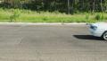 Moving sport racing cars chasing the leader in hot race at daytime Video