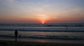 Father playing with child at the beach while sunset Video