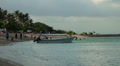 Scuba diver boat and tourists at Bali beach Video