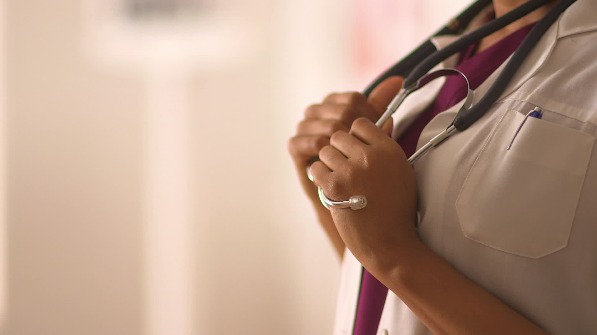 Close Up Of Female Doctor's Hands Holding Stethoscope Stock Video
