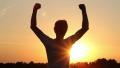 Winner achievement, young person happy at dusk