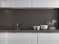 white ceramic dishes on worktop in the kitchen