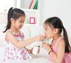 children eating yoghurt