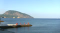 mooring with people on sea and beach Video