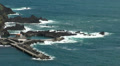 Rocky coastline with dock and swimming bath Video