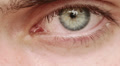 opening and closing of one eye of young man very sad - tears Video