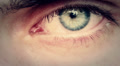 opening and closing of one eye of young man very sad - tears Video