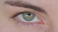 Close up of beautiful green woman's eye Video