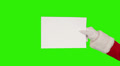 Santa Claus Presenting a White Sheet then sending a Kiss and saying Bye, Green