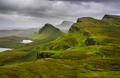 scenic view of quiraing mountains with dramatic sky, scottish highlands