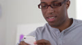Black business man using smart phone
