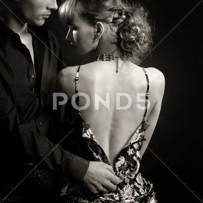 Black And White Photo Of Man Undress The Woman