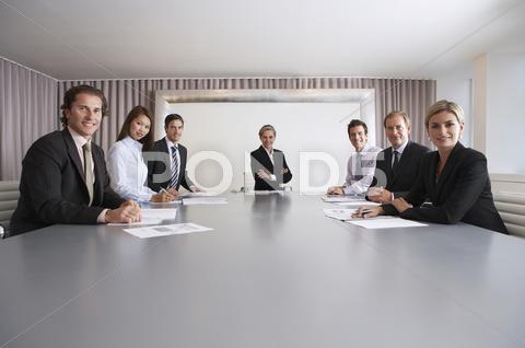 Confident Business People In Conference Room
