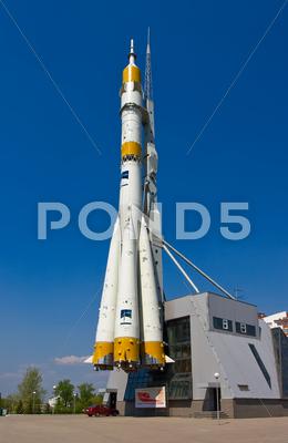 Russian Space Transport Rocket On Blue Sky Background