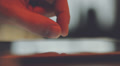 Close up hands touching tablet computer