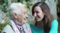 Grandmother and granddougher speaking
