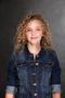 young beautiful woman with long curly blond hair