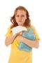 red haired woman blowing nose with hot water-bottle