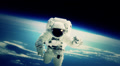 Astronaut on Space Walk with Shuttle