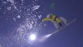 SLOW MOTION: Snowboarder jumps the kicker