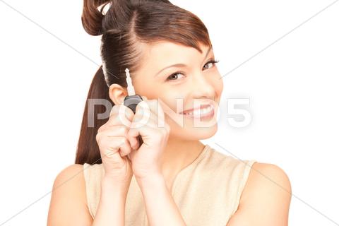 Stock photo of happy woman with car key