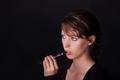young woman smoking e-cigarette