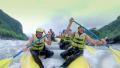 Senior people on rafting boat