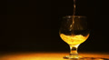 Gold cognac, brandy is poured Video