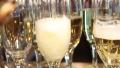Pouring a full beaker of champagne