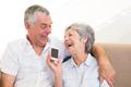 Couple using smartphone