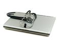 Stethoscope and laptop illustrating concept of digital security