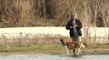 Fishermens and dog on the river bank Video