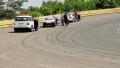 Mechanics crew, safety marshal check race car breakdown on track Video