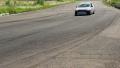 Sport cars chasing leader leaving rubber traces on asphalt track Video