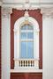 A vertical window with columns. Architectural detail of the Nati
