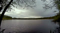 Thick rainy clouds over a lake in a nature reserve Video