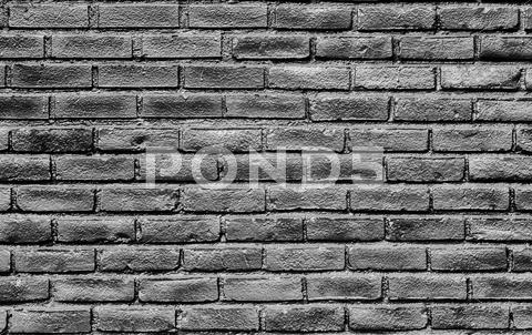Stock photo of High Contrast Glossy Brick Wall