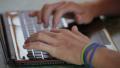 Writing on laptop Video