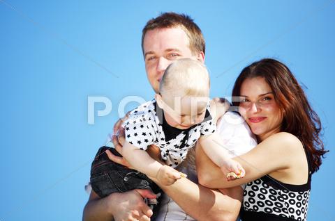 Stock photo of happy family in sky