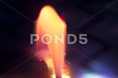 Stock photo of Dancing Multi Colored fountain at dark night