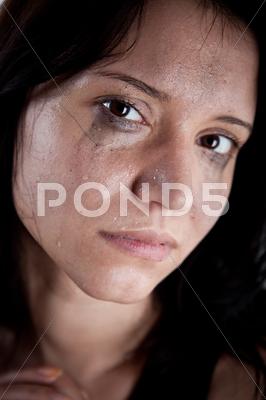 Stock photo of crying young woman