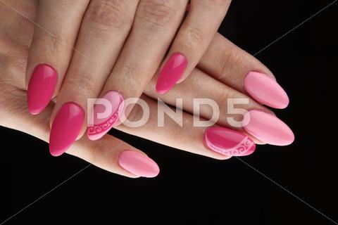 Pink Painted Nails And Hands Isolated On Black Background