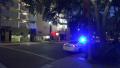 Police Car With Flashing Lights On Nighttime Street HD Video