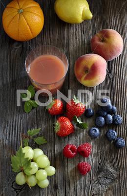 Variety Of Fresh Fruit And Fruit Juice