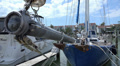 Close Up Of The Bow Of A Blue Sail Boat In Marina HD Video