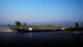 Boats go by a floating farm at Inle Lake, Myanmar. Video