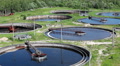 Aerial view of several sedimentation basins with scrapers for sewage cleaning Video