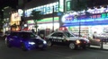 Three Police Cars At An Incident Outside Fussa Train Station Tokyo 02 HD Video